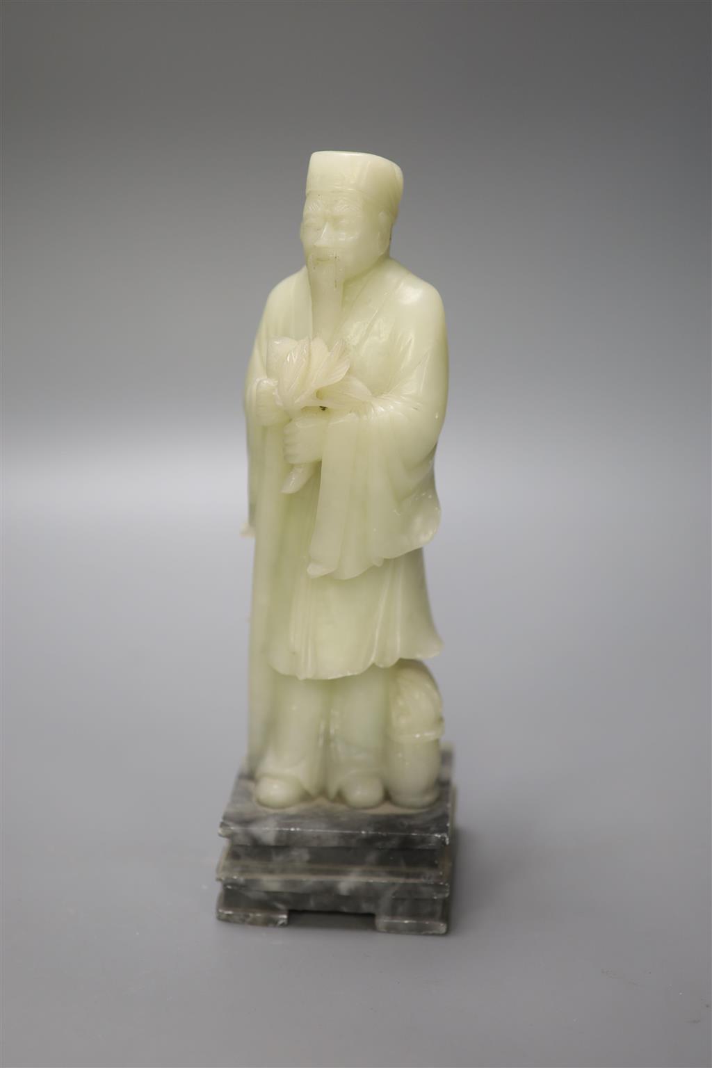 A Chinese soaptone carved figure of a sage, 25.5cm high including stand